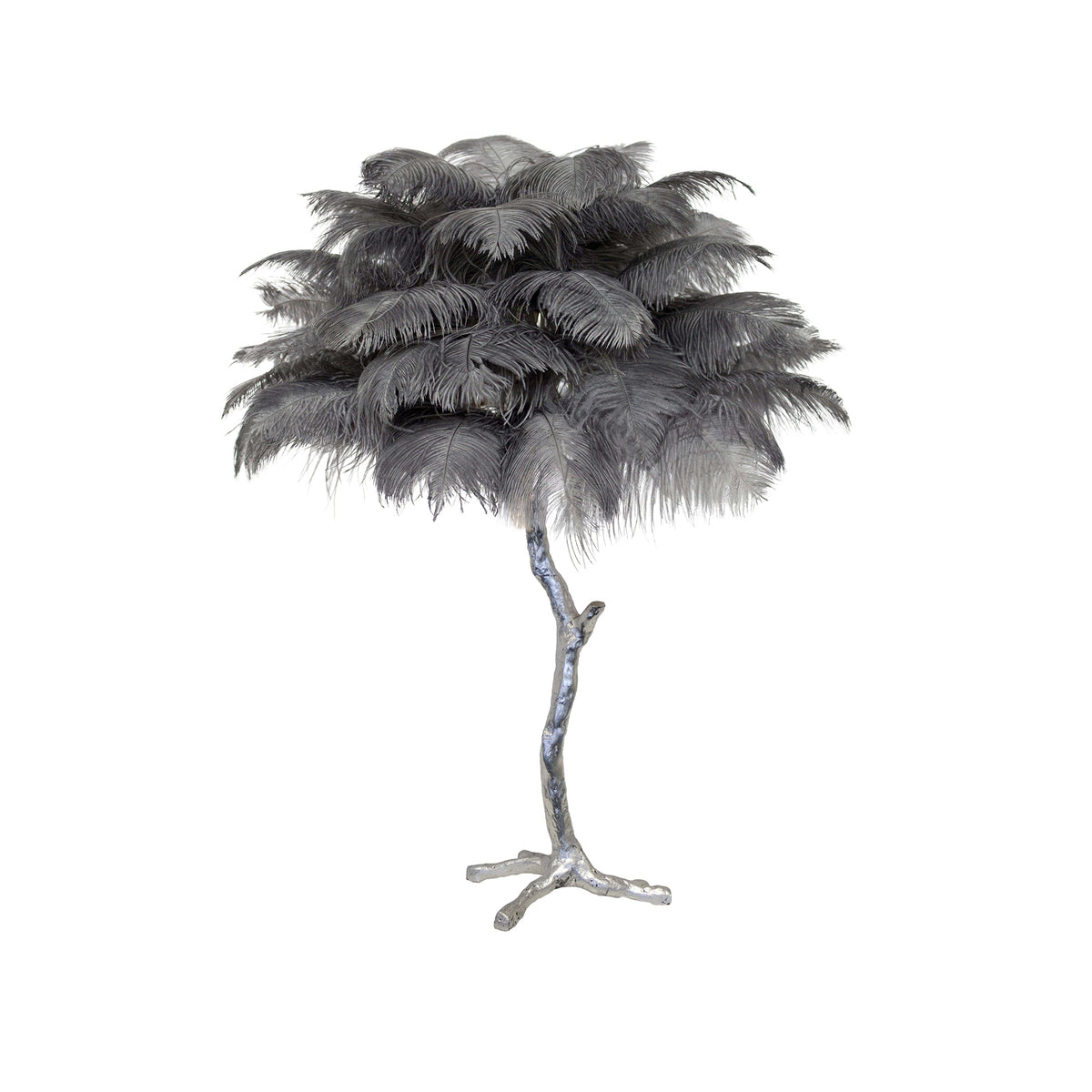 Clérachic table lamp with layered grey feathers on a silver branch stem with splayed feet, on a white background.
