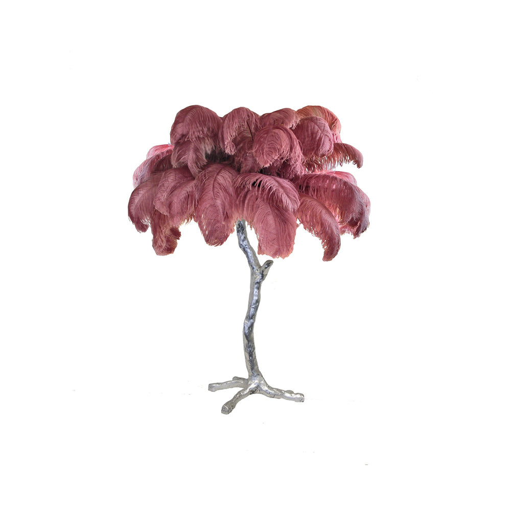 Clérachic table lamp with dusky rose-mauve feathers on a silver branch stem, on a white background.