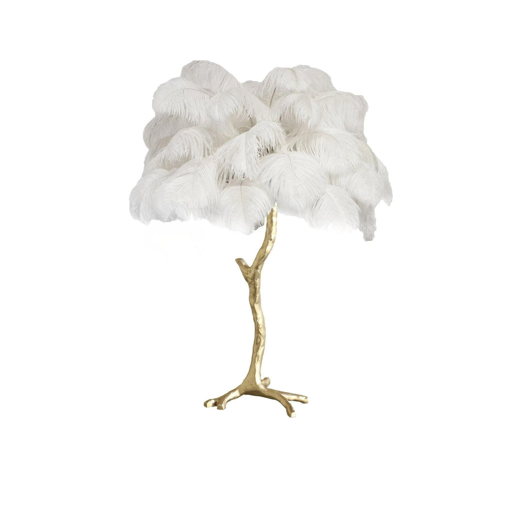 Clérachic table lamp with fluffy white ostrich feathers on a gold branch stem, shown on a white background.