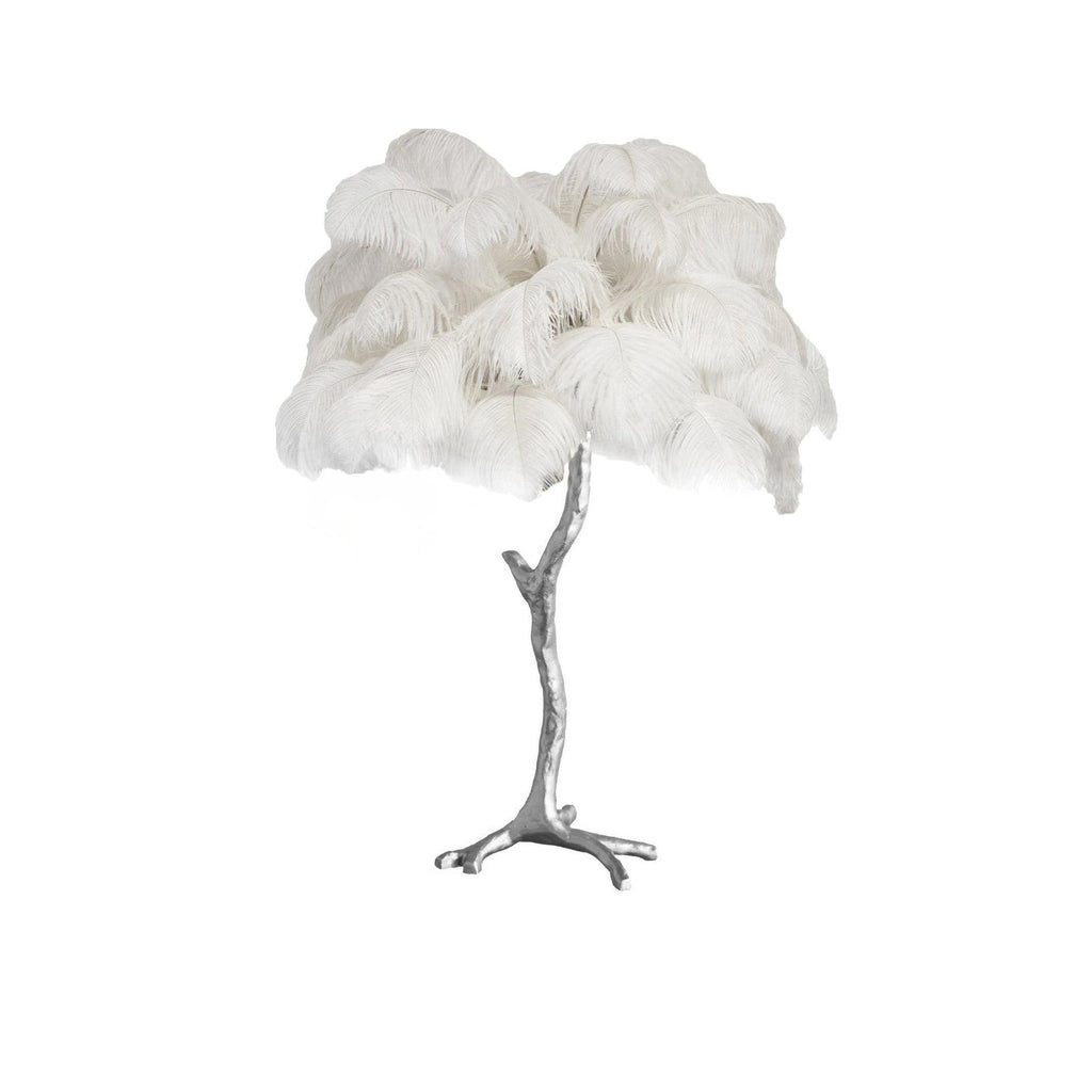 Clérachic table lamp with fluffy white feathers on a silver branch stem, shown on a white background.
