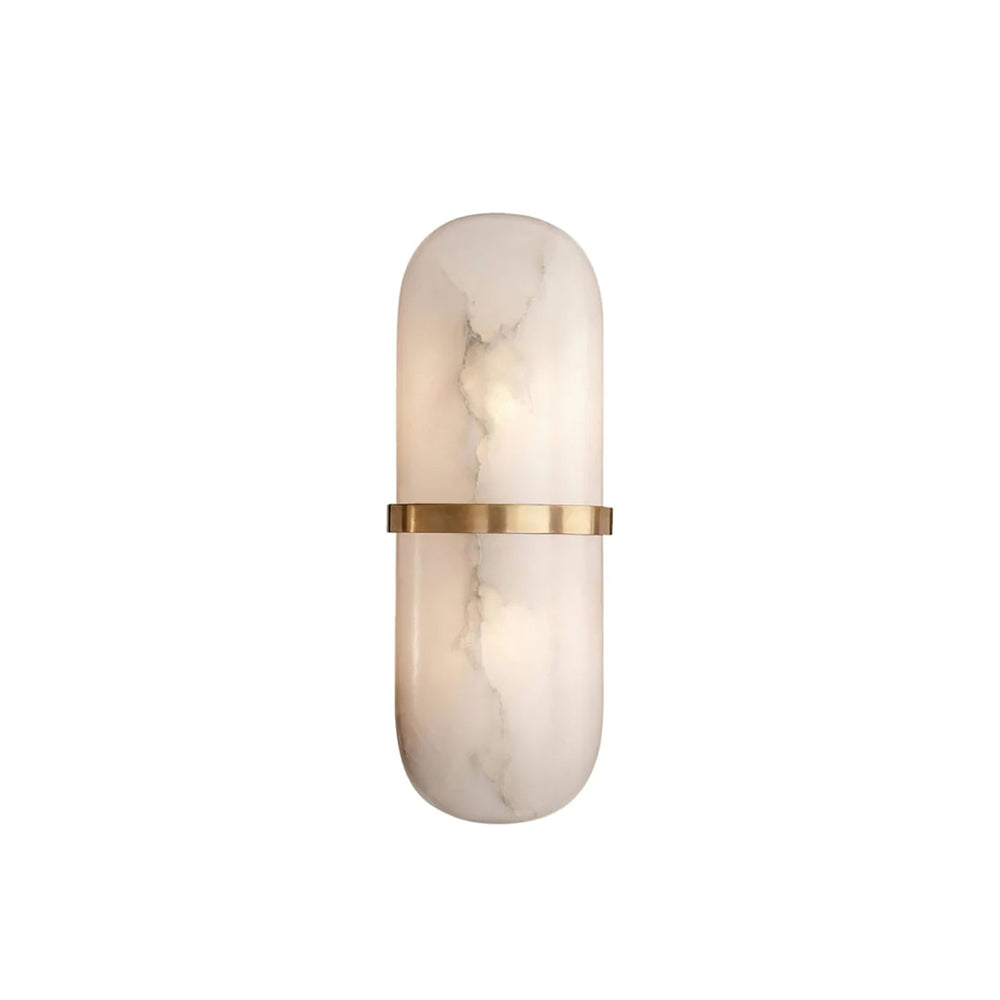 Clérachic alabaster sconce on white, showing the rounded pill silhouette and the brass band wrapping its waist.