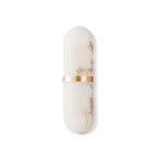 The Clérachic sconce shown upright on white, apricot veining running the length of the alabaster body.