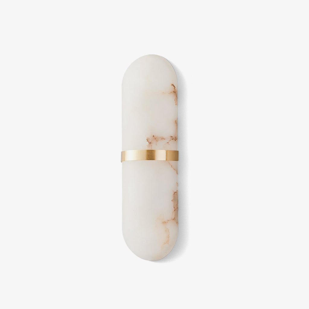 Clérachic alabaster wall lamp on a pale grey ground, rust-toned veining threading through the stone.
