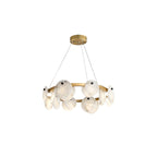 Clérachic alabaster chandelier at a slight turn, the stone discs overlapping in a double row around the brass ring.