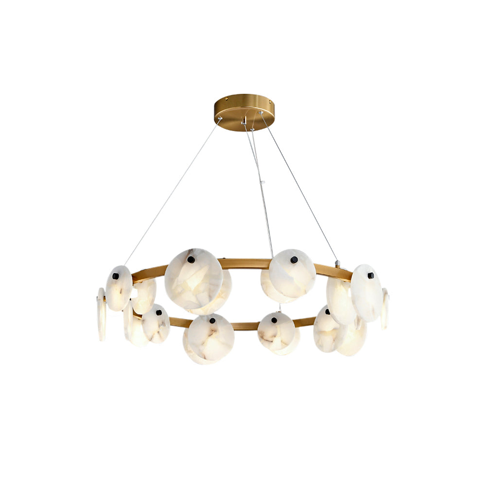 Clérachic chandelier at eye level, alabaster discs alternating with glowing orbs along the gold-toned brass band.