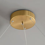 Clérachic round brass ceiling canopy seen from below, with three fine suspension cables anchored at its rim.