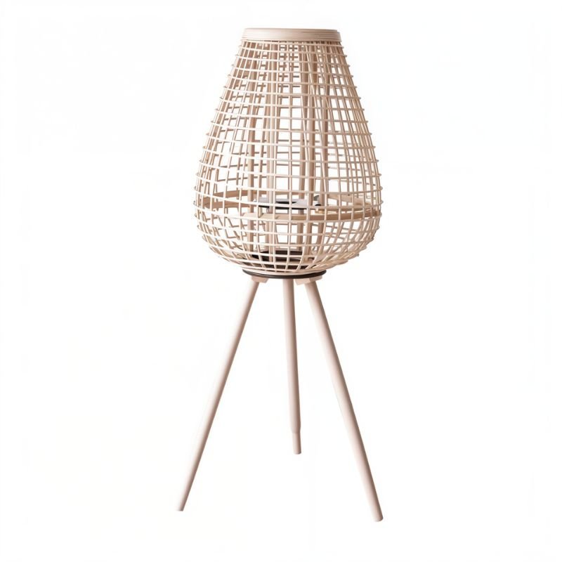 Clérachic tallest teardrop lantern in pale woven cane on three slim wooden legs, open weave around a candle space.