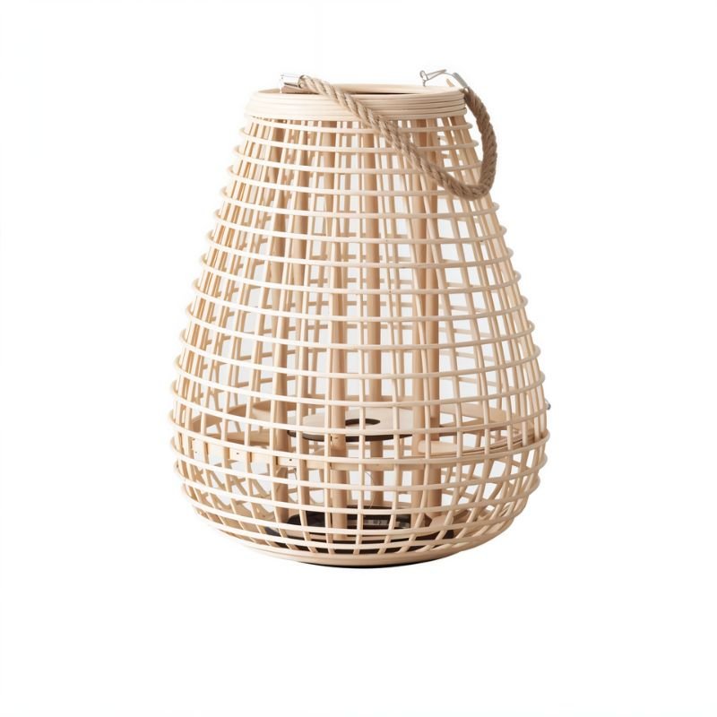 Clérachic broad teardrop lantern in pale woven cane with a twisted rope handle, open weave around a candle space.