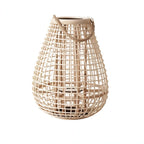 Clérachic large teardrop lantern in pale woven cane with a rope handle, shown against a plain white backdrop.