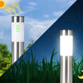 Clérachic silver solar path light shown charging by day and glowing white at night, split in one frame with a battery icon.