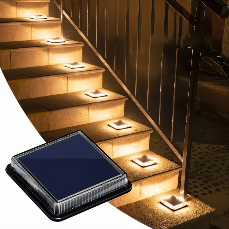 Clérachic solar stair lights set into each stone step of a staircase, glowing warm, with a close-up of one unit.