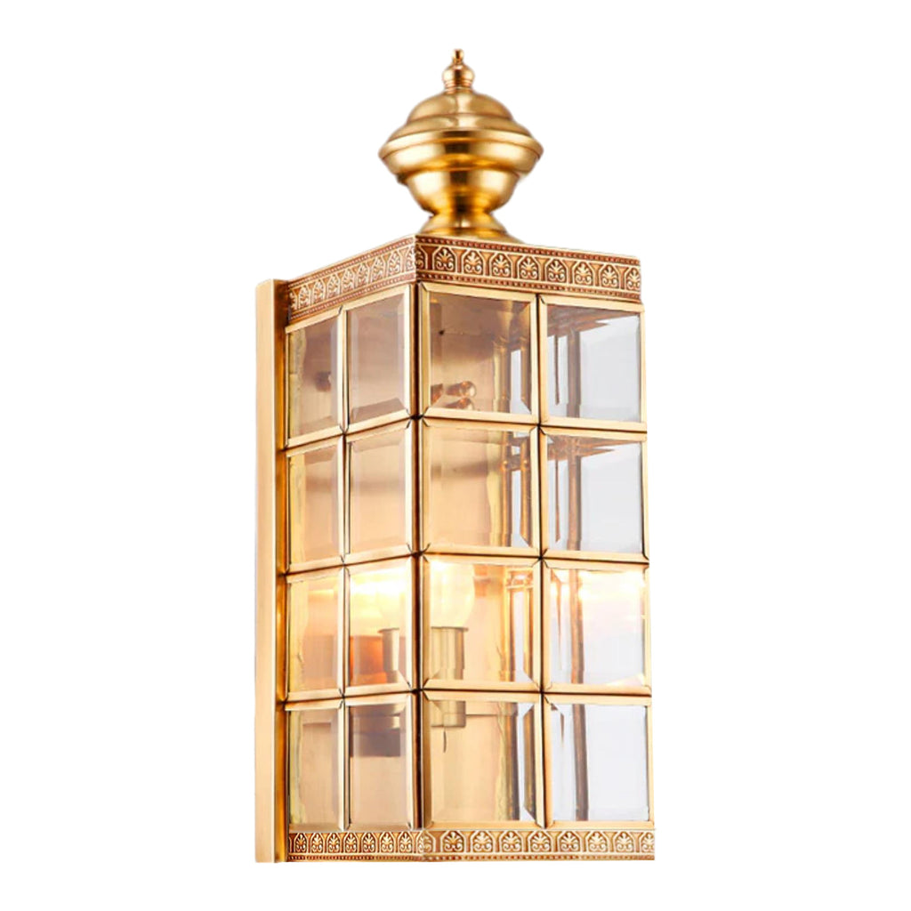 Angled view of this Clérachic brass wall light on white, the glass panes and etched border showing along the side.
