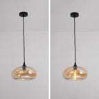 Side-by-side of the Clérachic oval pendant light in amber glass, unlit on the left and lit on the right at full cord drop.