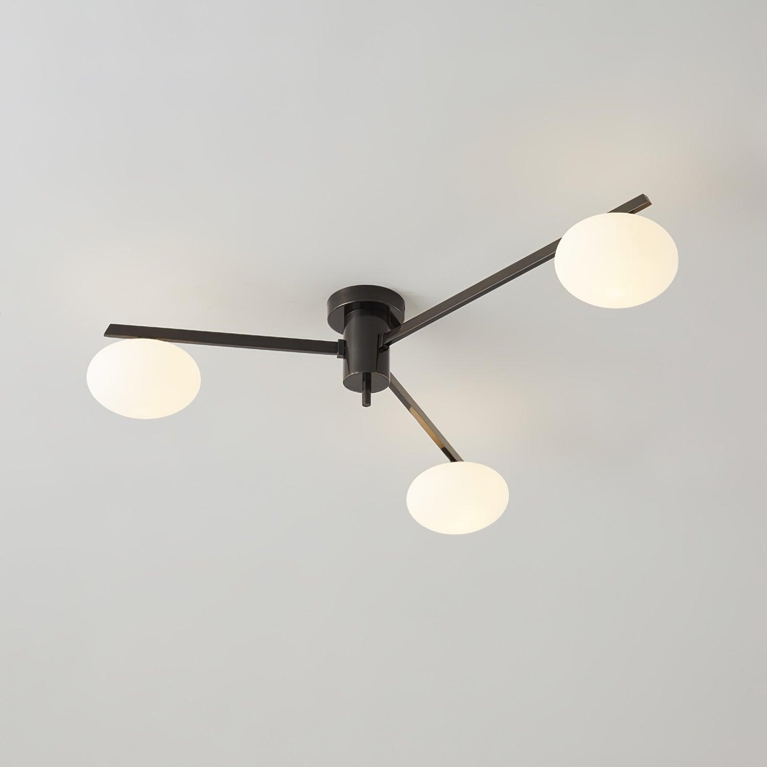 Clérachic Oval Opal Glass Ceiling Light in matte black, three opal ovals on flat blade arms, mounted tight to the ceiling.