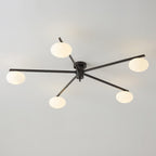 Clérachic Oval Opal Glass Ceiling Light in black with five oval shades splayed on long blades over a grey ceiling.
