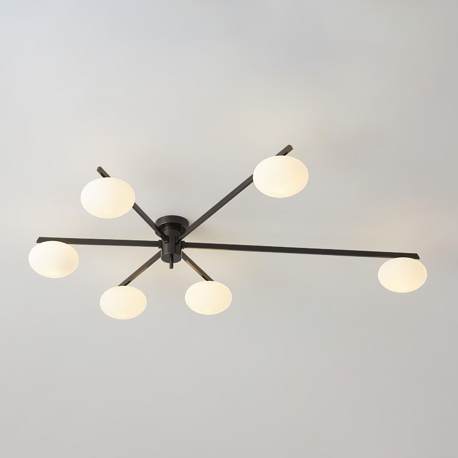 Six-head Clérachic Oval Opal Glass Ceiling Light in matte black, the longest blade arm stretching across the room.