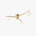 Clérachic Oval Opal Glass Ceiling Light, brass three-head, shown on plain white so the arm angles read clearly.