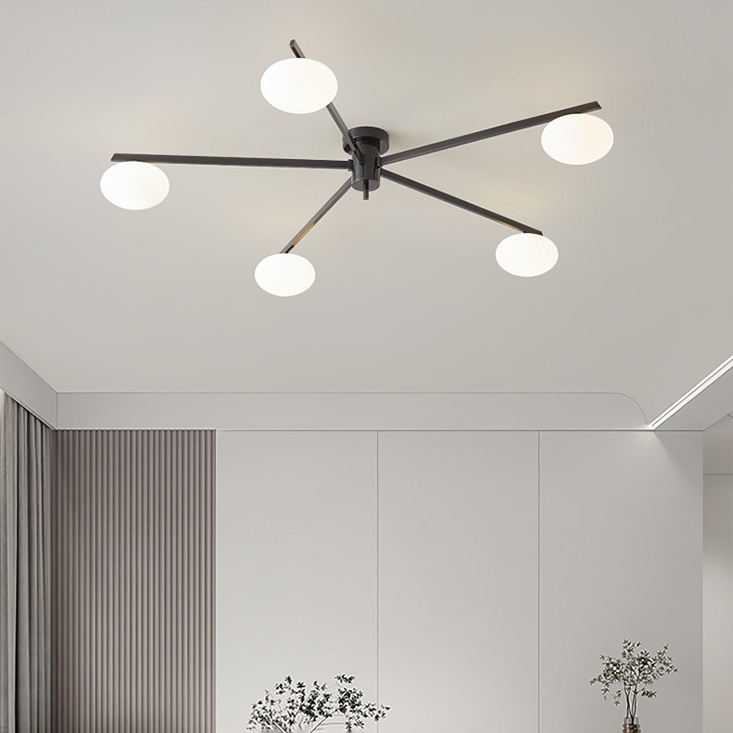 Clérachic Oval Opal Glass Ceiling Light in black over a living room with ribbed curtains and pale cabinetry.