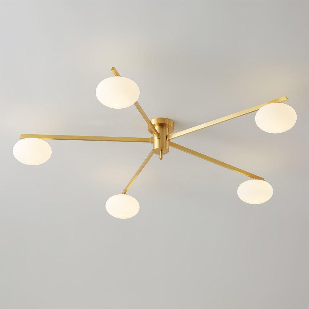 Clérachic Oval Opal Glass Ceiling Light in brass with five shades, arms set at even angles on a grey ceiling.