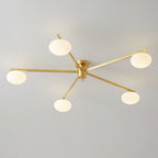 Clérachic Oval Opal Glass Ceiling Light in brass with five shades, arms set at even angles on a grey ceiling.