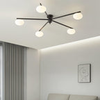 Clérachic Oval Opal Glass Ceiling Light in black lighting a living room with cove lighting and a framed sketch.