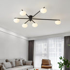 Clérachic Oval Opal Glass Ceiling Light in black seen close under the ceiling of a curtained sitting room.