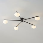 Clérachic Oval Opal Glass Ceiling Light in black with five shades, arms crossing over a plain grey ceiling.