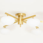 Underside detail of the Clérachic Oval Opal Glass Ceiling Light in brass, blade arms bolted to a round canopy.