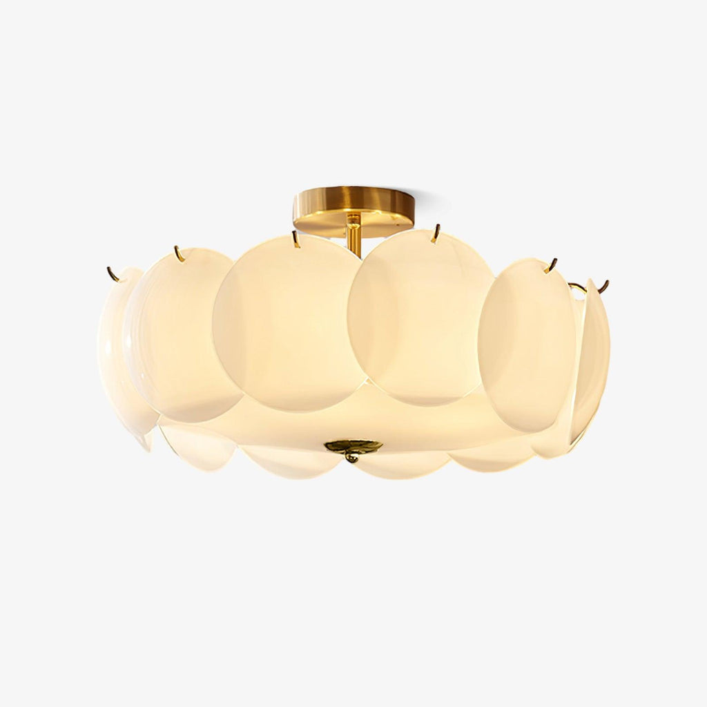 The Clérachic overlapping glass disc semi-flush ceiling light switched on against a plain white backdrop.