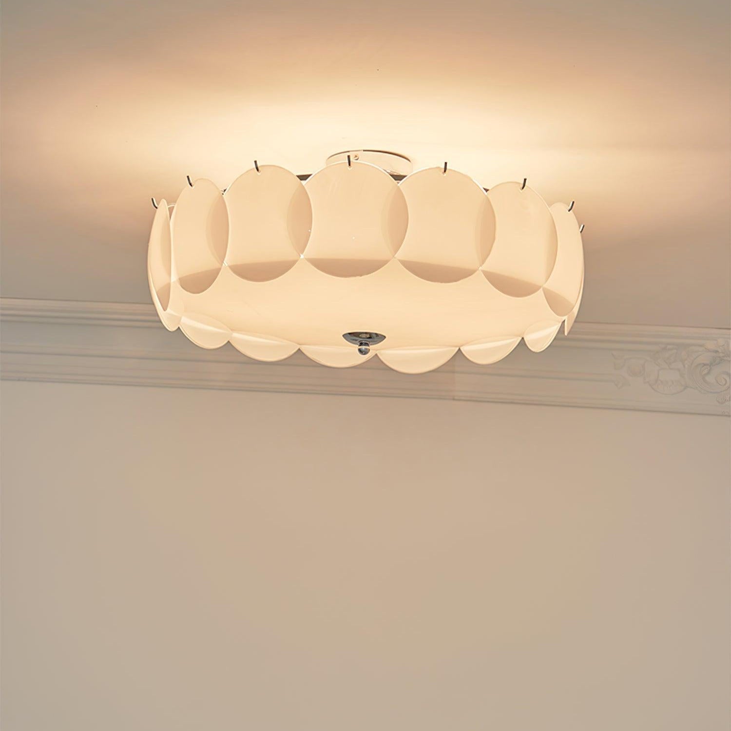 Close studio view of the unlit Clérachic overlapping glass disc semi-flush ceiling light showing its layered glass discs.