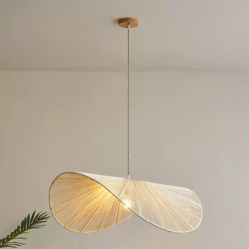 Full-drop studio shot of this Clérachic pendant, its twisted cord dropping from a round wood canopy.