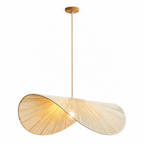 This Clérachic pendant shown in a lighter beige finish, its twisted cord dropping to a warm lit centre.
