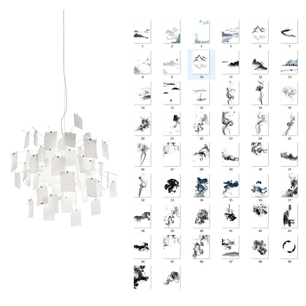 A grid of ink-wash landscape and smoke-pattern cards stands beside this Clérachic paper pendant on a white ground.