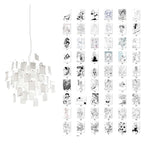 A grid of black and white anime-style sketch cards sits beside this Clérachic paper pendant on white.