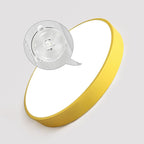 This mustard-yellow Clérachic flush mount ceiling light is shown at an angle with a callout on its diffuser lens.