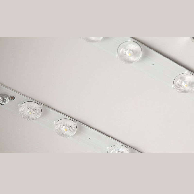 Close-up of the integrated LED array inside a Clérachic flush mount ceiling light, showing the dimmable diode strip.