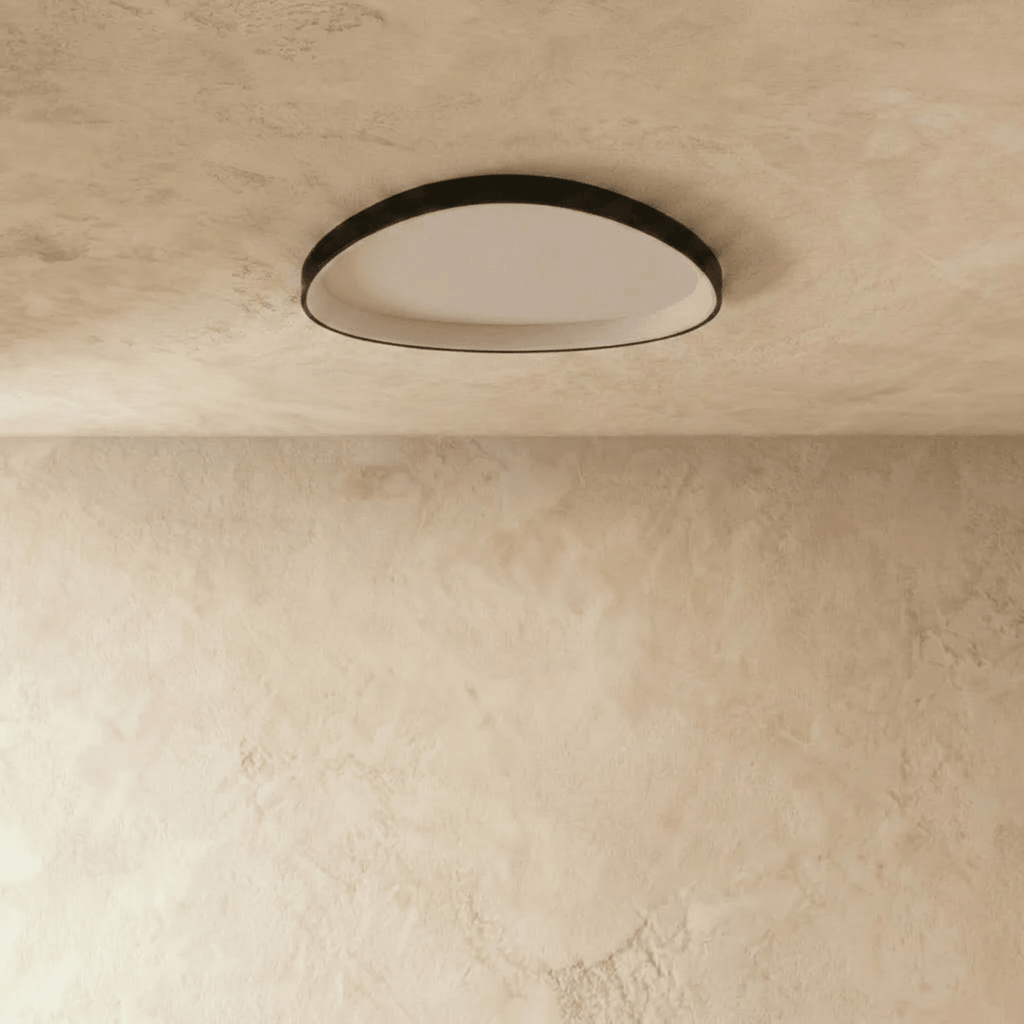 Clérachic black aluminium ceiling light switched off, showing the matte white diffuser inside its slim black rim.