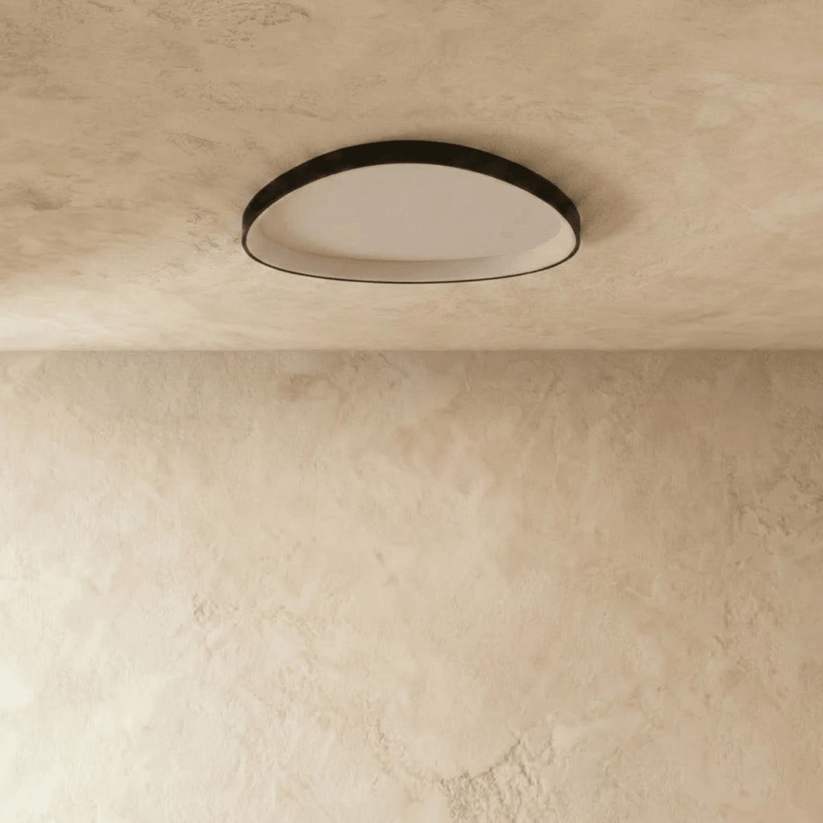 Clérachic black aluminium ceiling light switched off, showing the matte white diffuser inside its slim black rim.
