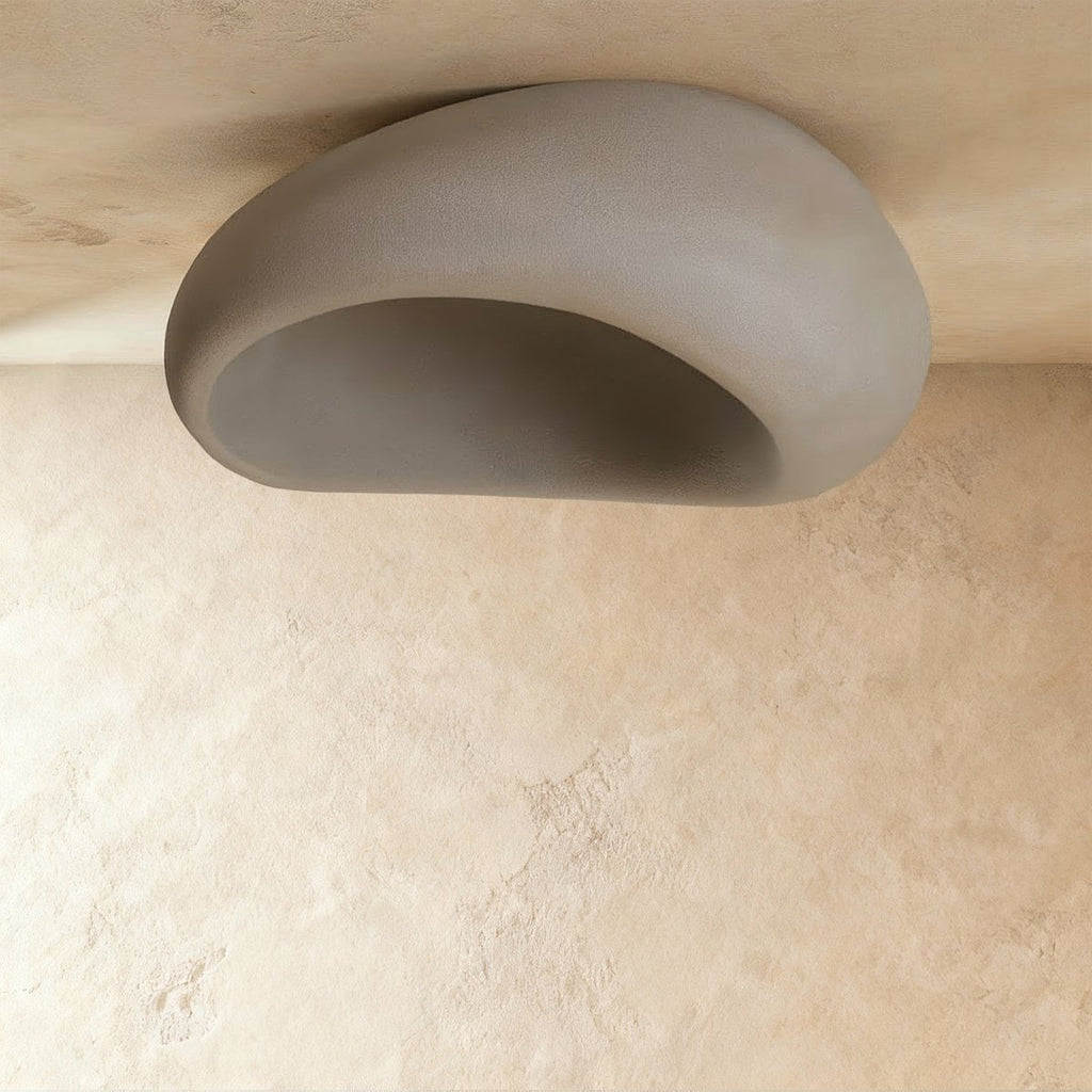 Clérachic large grey pebble ceiling light shown unlit, with a matte shell and a soft grey hollow interior.