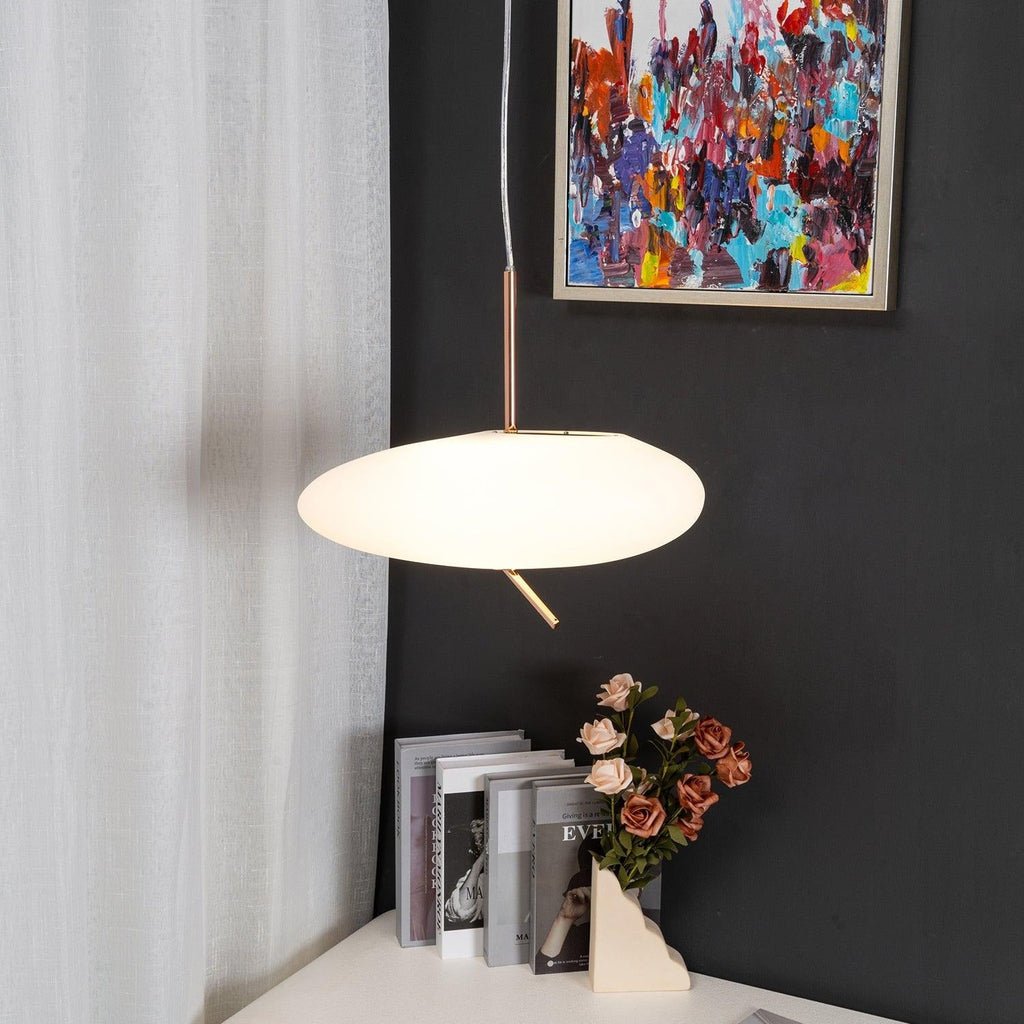 The full Clérachic fixture drops beside the same painting and roses, its stem and canopy fully visible here.