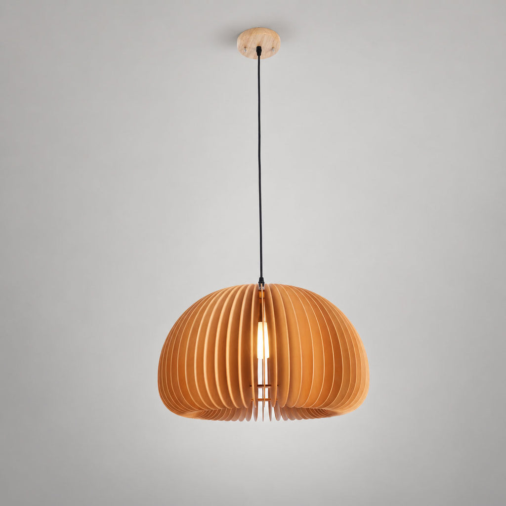 A Clérachic natural wood pendant with a round wooden ceiling plate, hung on a black cord against a soft grey backdrop.