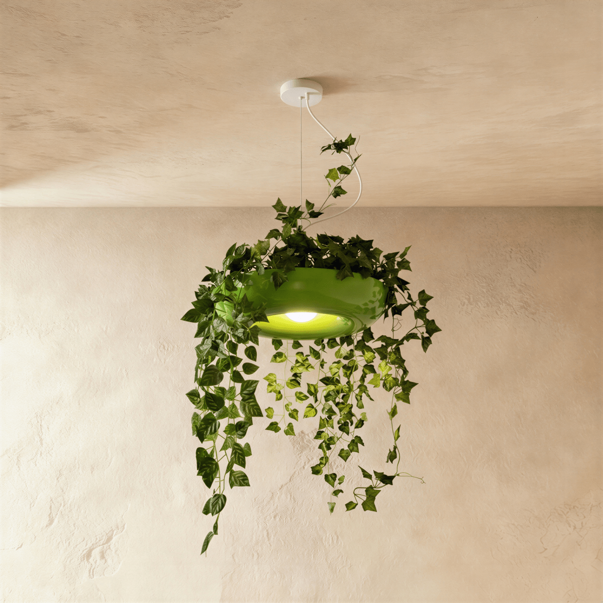 Clérachic green planter-style pendant on a white canopy, with artificial ivy trailing down and a bright bulb lit below.
