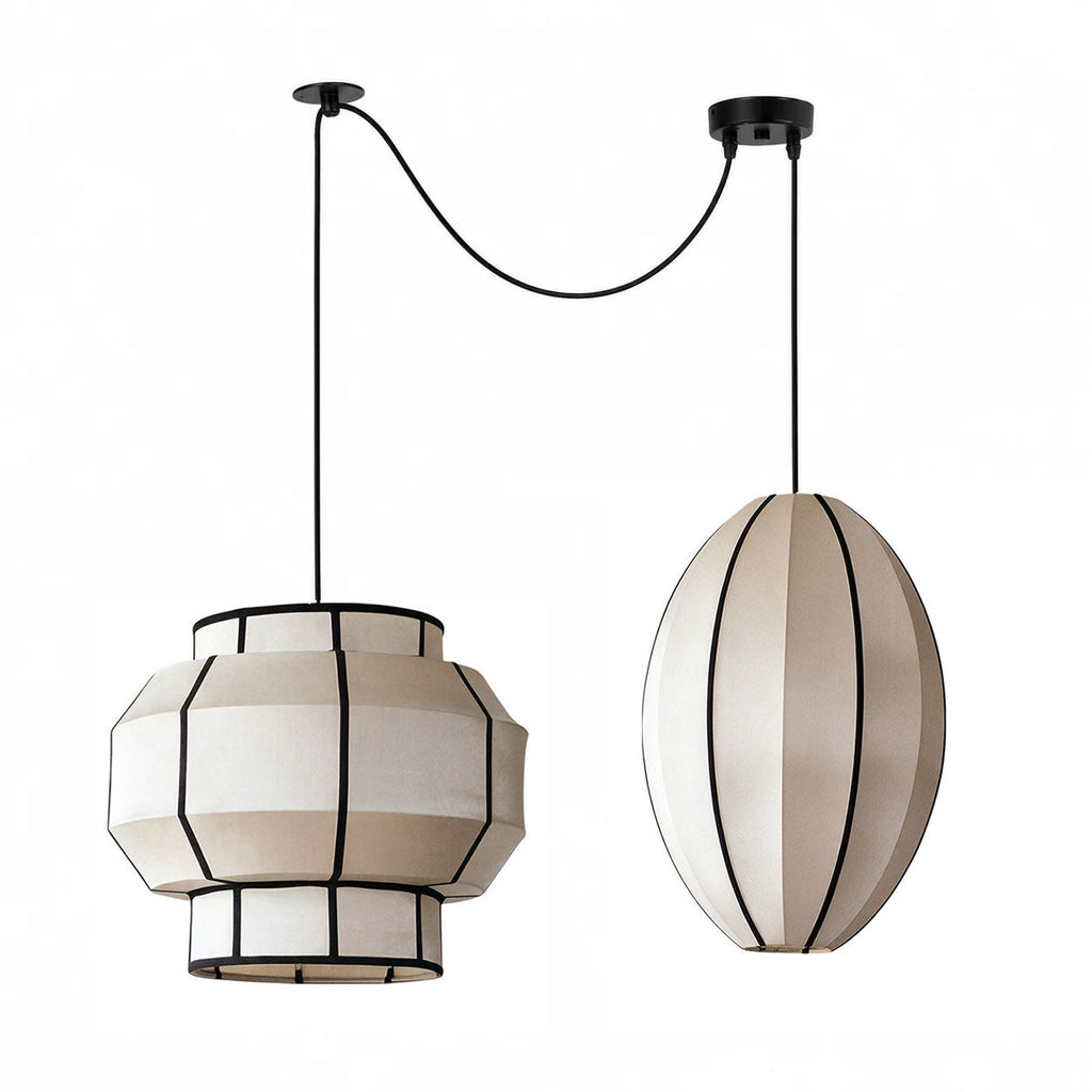 This Clérachic fixture pairs a tiered barrel shade with a vertical oval shade on crossed cords.