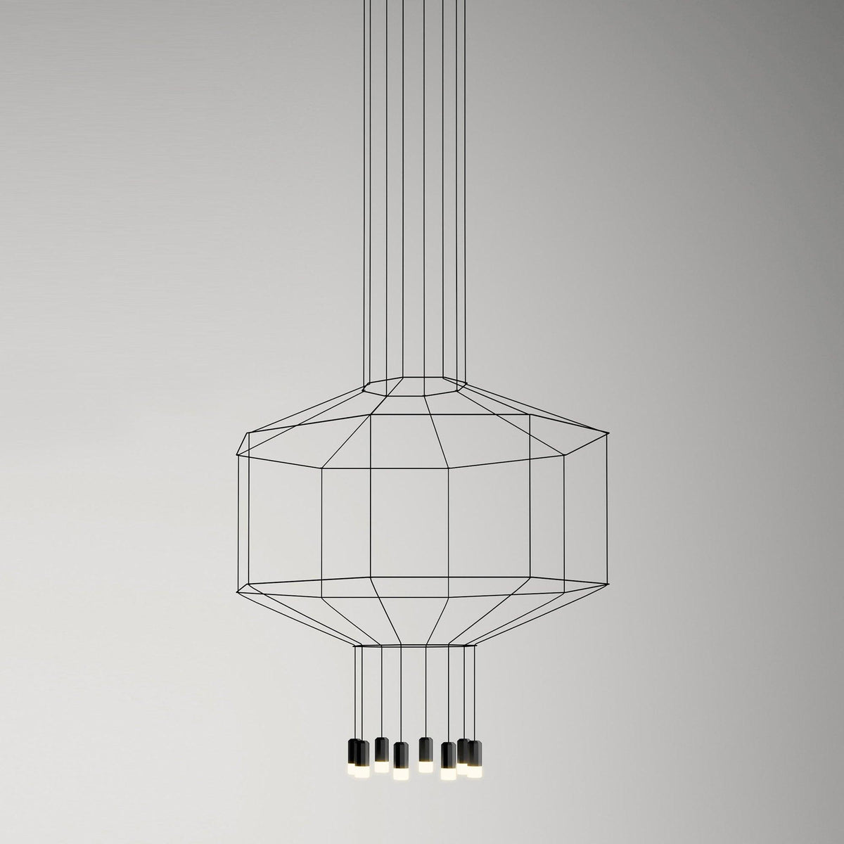 Octagonal black cable cage pendant with a cluster of light heads below, on a soft grey backdrop, from Clérachic.