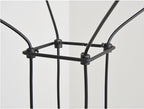 Close view of a cable joint where the black wires meet at a square frame corner on this Clérachic pendant.
