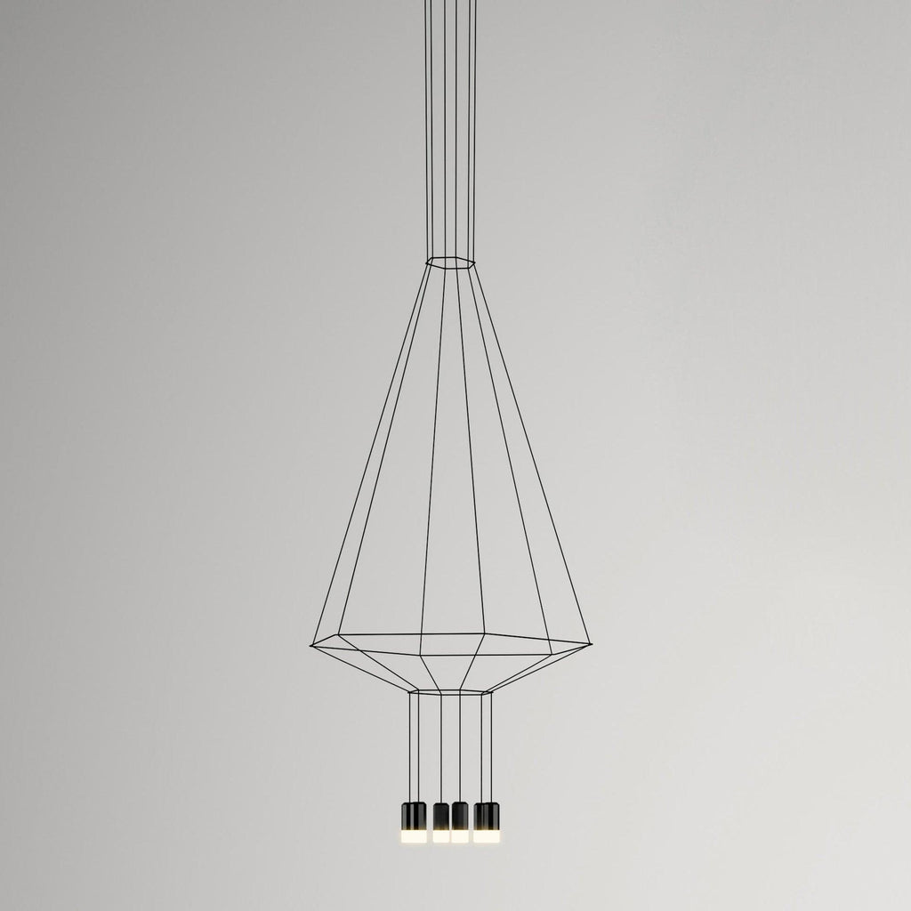 Cone-shaped black cable pendant narrowing to a hexagonal base, with four small lights, on a grey backdrop, from Clérachic.