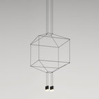 Cube-shaped cable-frame pendant with two small lights hanging beneath, on a plain grey backdrop, from Clérachic.