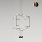 Cube-shaped wireframe pendant with two small lights below, on a pale grey backdrop, with a small detail inset, from Clérachic.