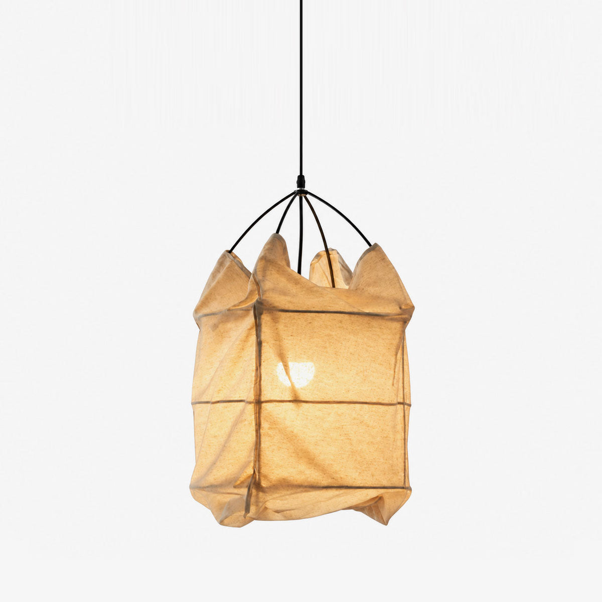 The curved wire-rib cage gathers a beige fabric shade on this Clérachic pendant, shown on a plain white backdrop.
