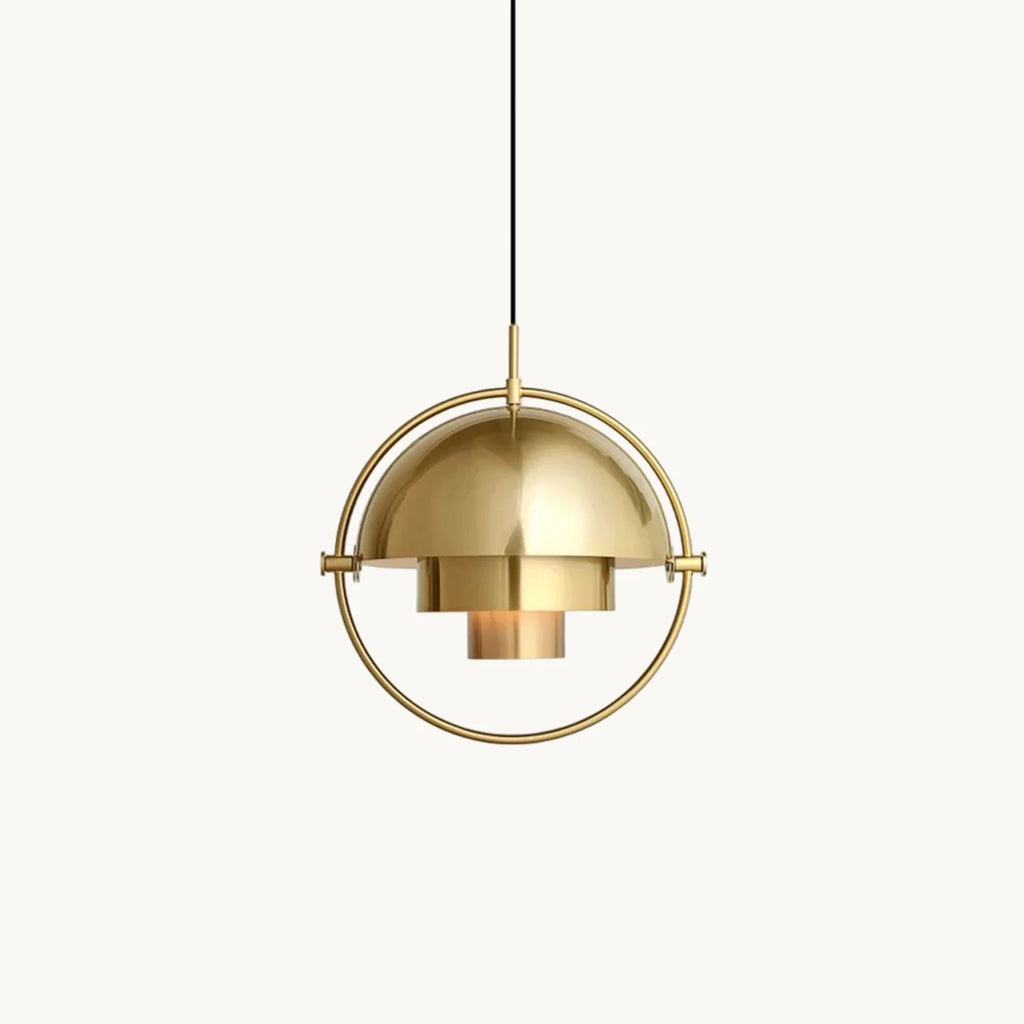 Gold-toned Clérachic pendant with a domed shade and stepped inner cylinders, held in a round frame, on a plain white backdrop.